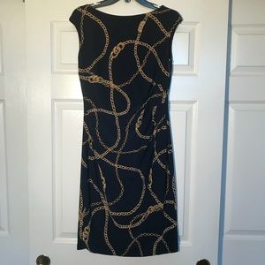 Form fitting black sheath-works both day and eve.